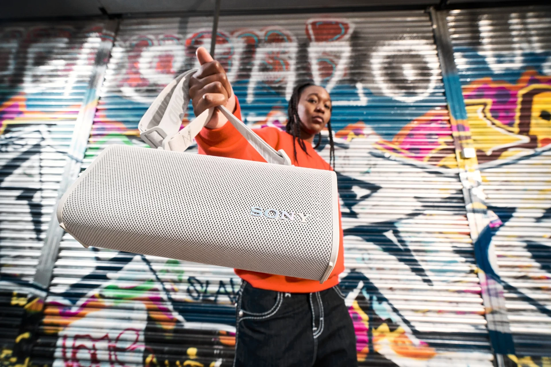 Sony campaign woman holding speaker